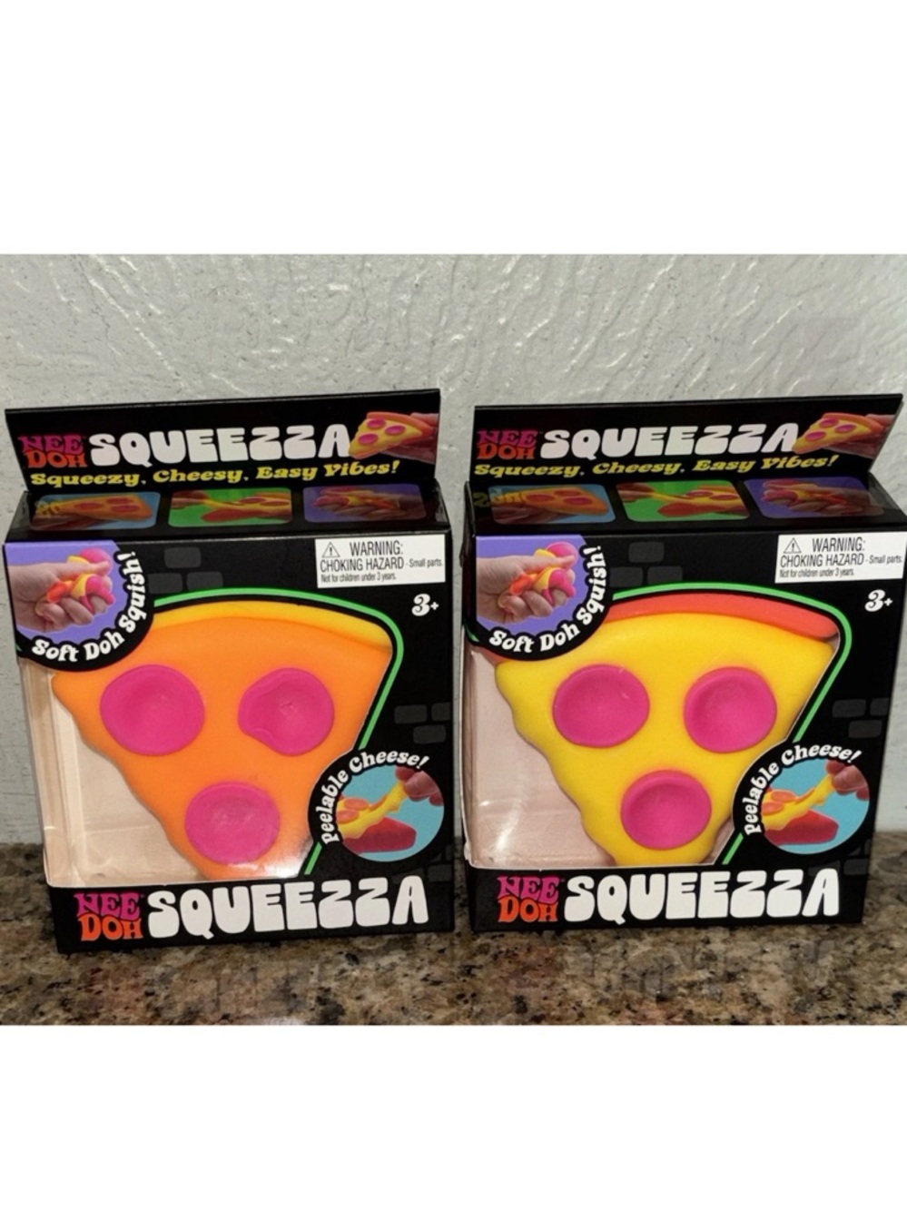 NeeDoh Squeeza Pizza Squishy Toy - Yellow & Orange with Pink Toppings